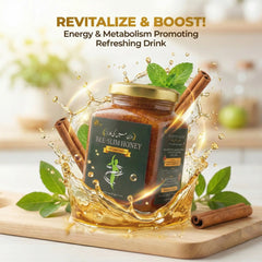 Bee-Slim Honey jar with honey splashing around on a wooden board, surrounded by cinnamon sticks and mint leaves.
