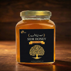Jar of Sidr Honey with a black label on a wooden surface